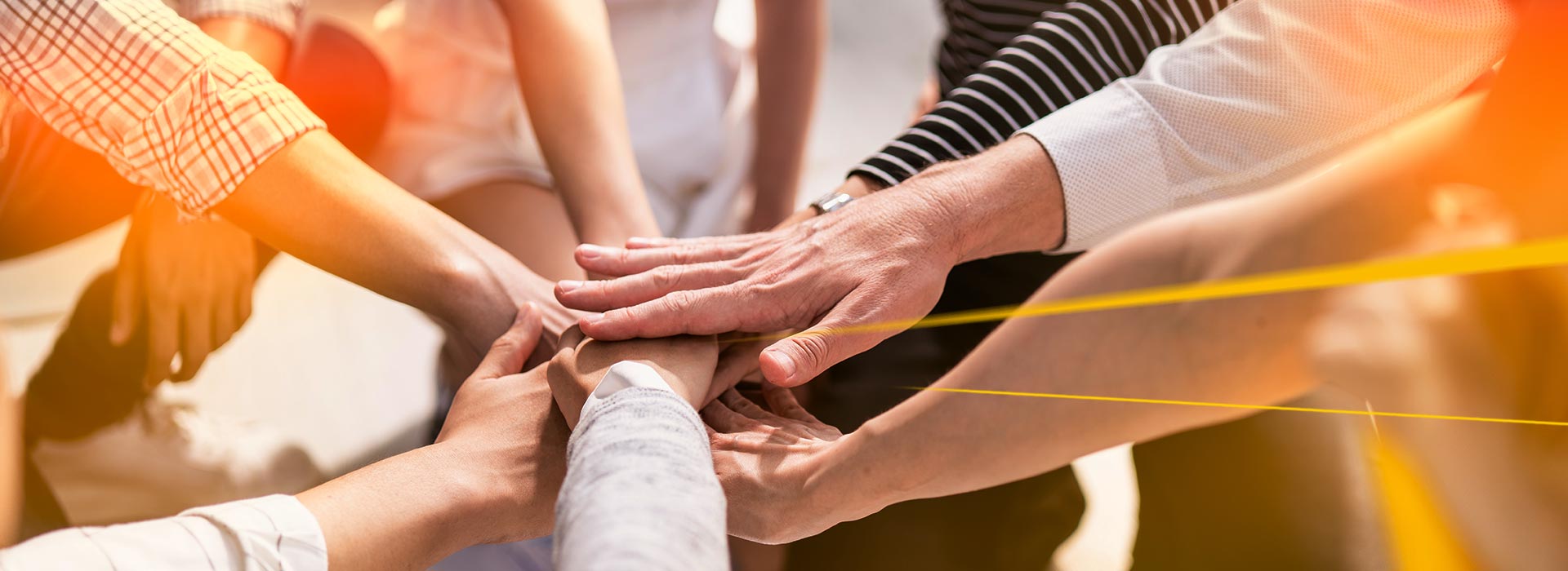 People put hands together LGI Social care