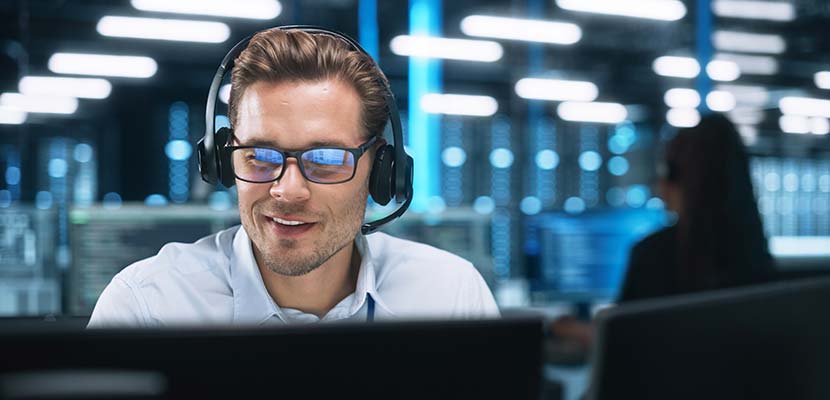 PTS employee at desk | LGI