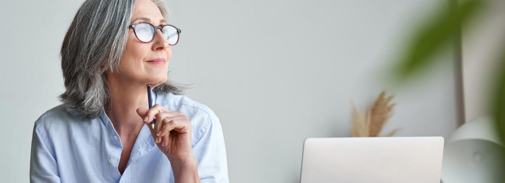 Woman on desk Glossary A